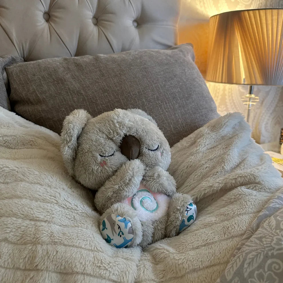 Alvást segítő plüss koala